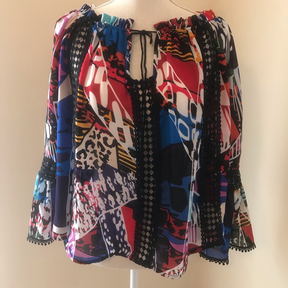 • Women’s Blouse.  Brand New Without Tags